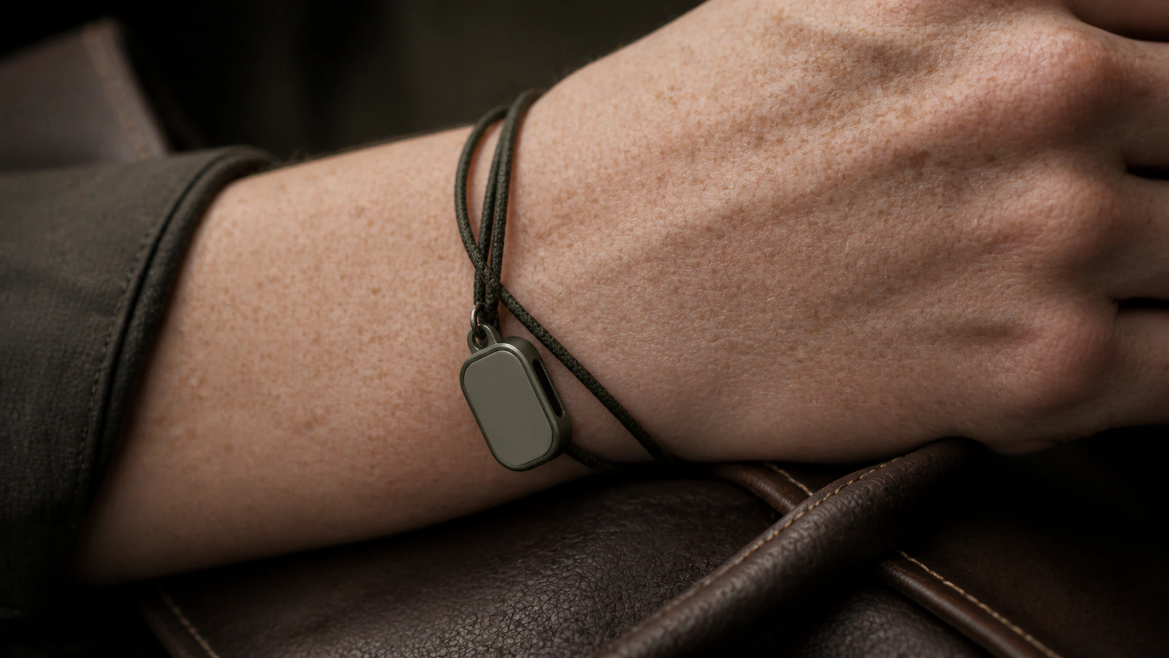 Field green Presence Key worn as a bracelet charm