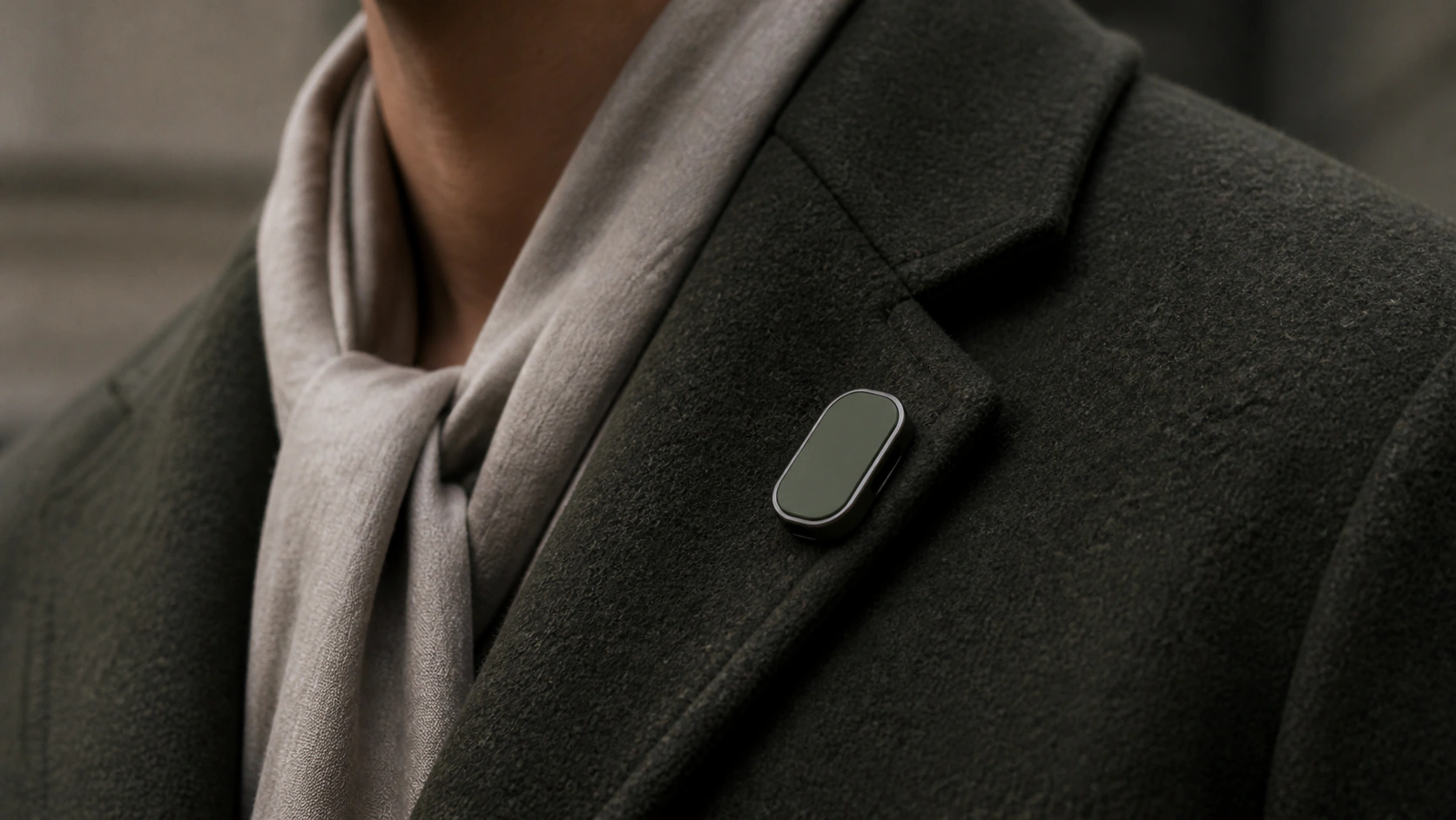Field green Presence Key worn on a lapel