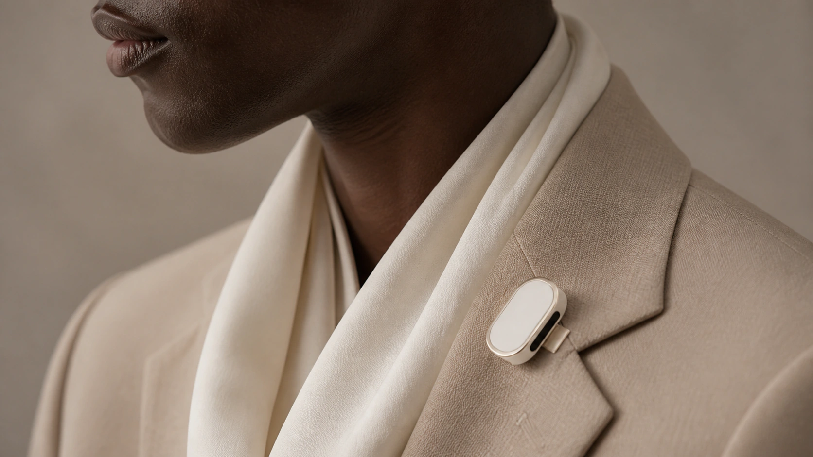 Ivory Presence Key worn on a tailored lapel