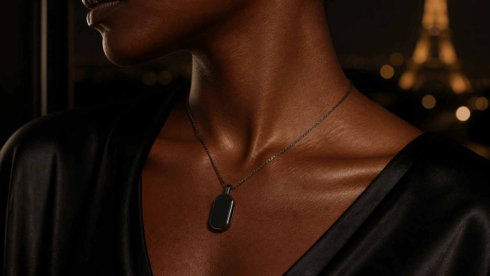 Graphite Presence Key worn as an evening necklace