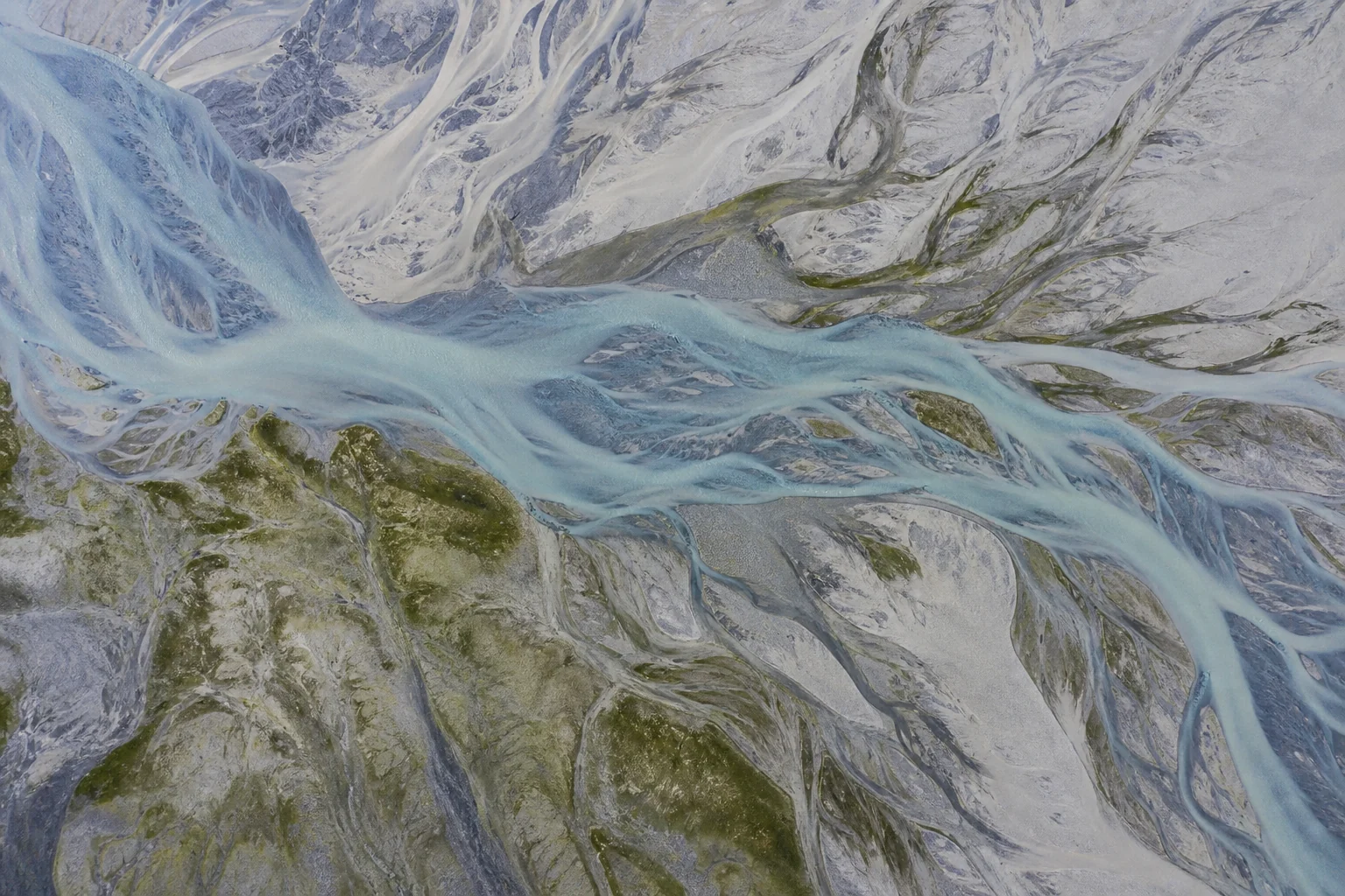 Aerial river delta illustrating a physical signature formed in the real world